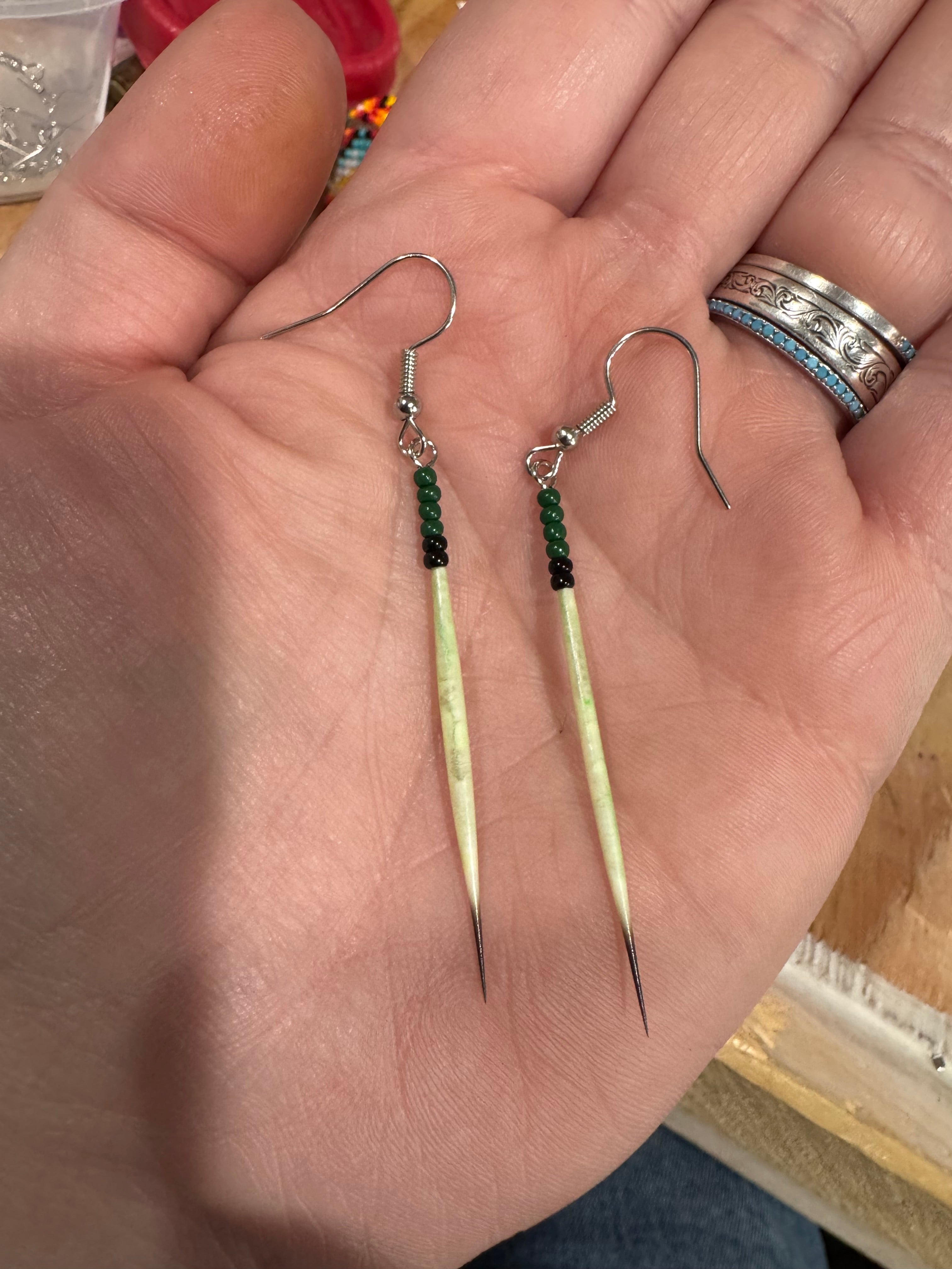 Dark green and black quill earrings