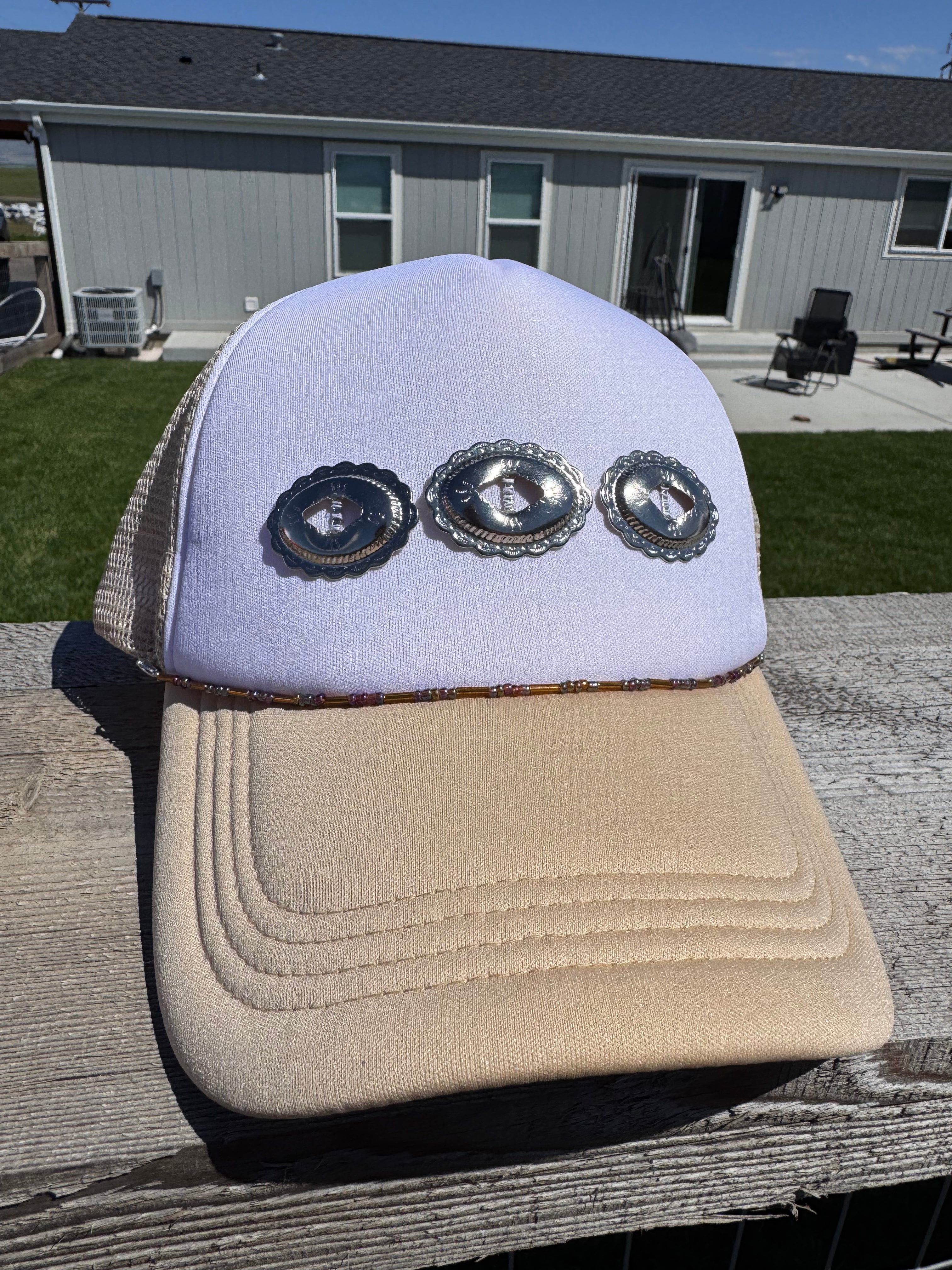 Western conch tan hat with beaded hat chain