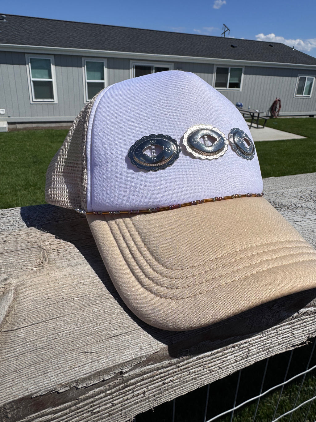 Western conch tan hat with beaded hat chain