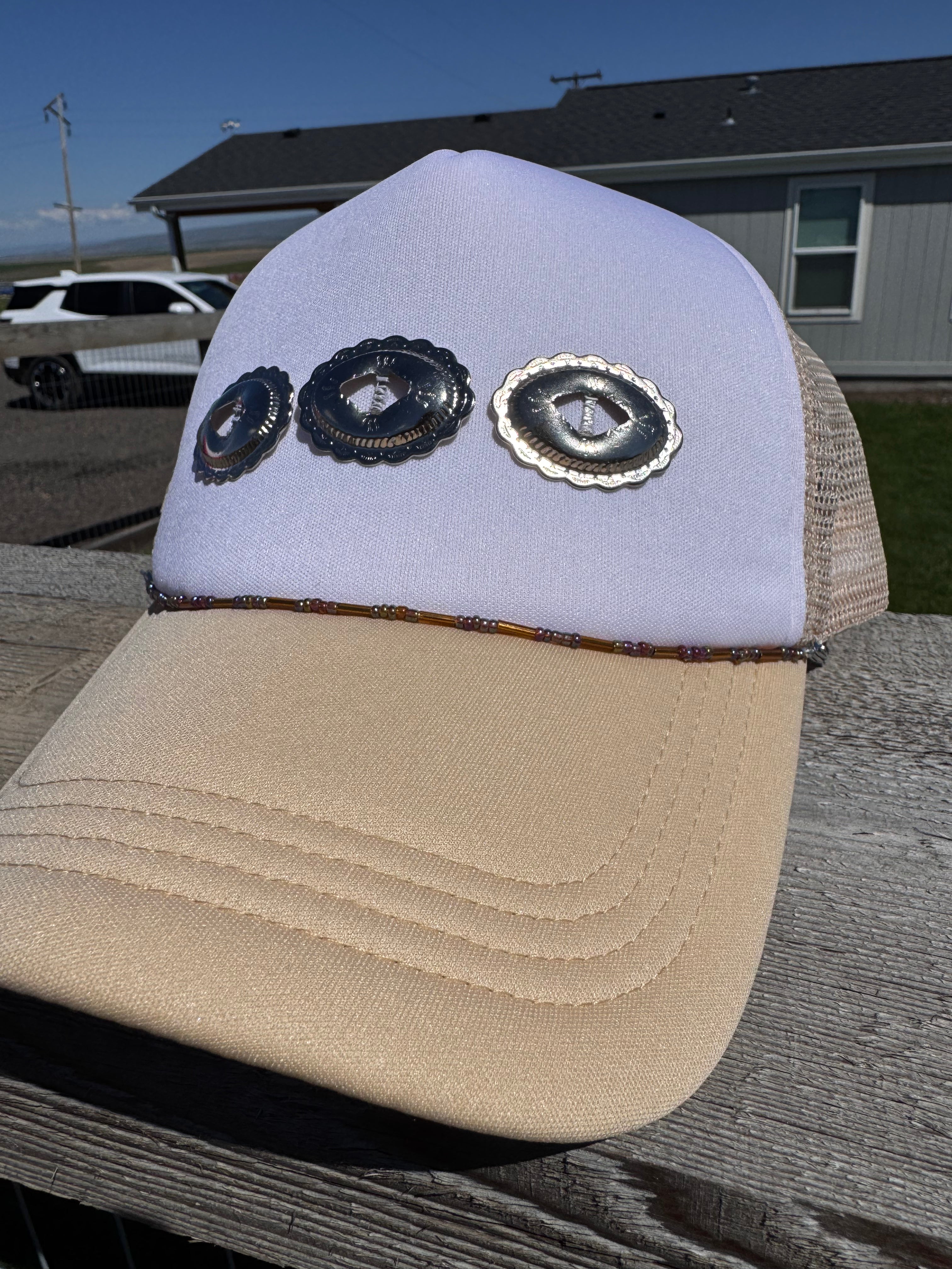 Western conch tan hat with beaded hat chain